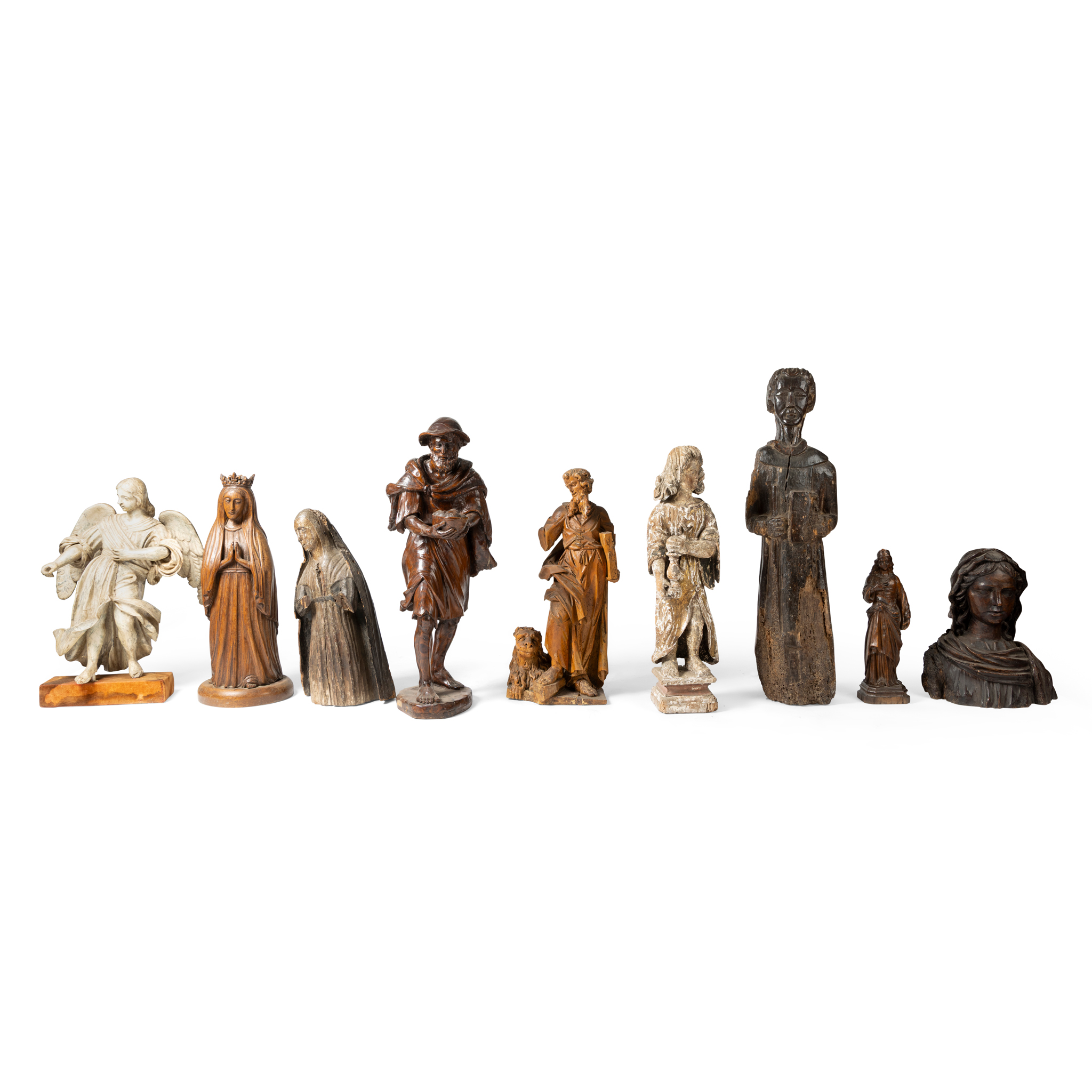 A GROUP OF CARVED FIGURES OF SAINTS AND ALLEGORICAL FIGURES
