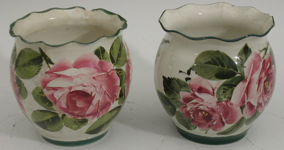 A pair of Wemyss ovoid vases,