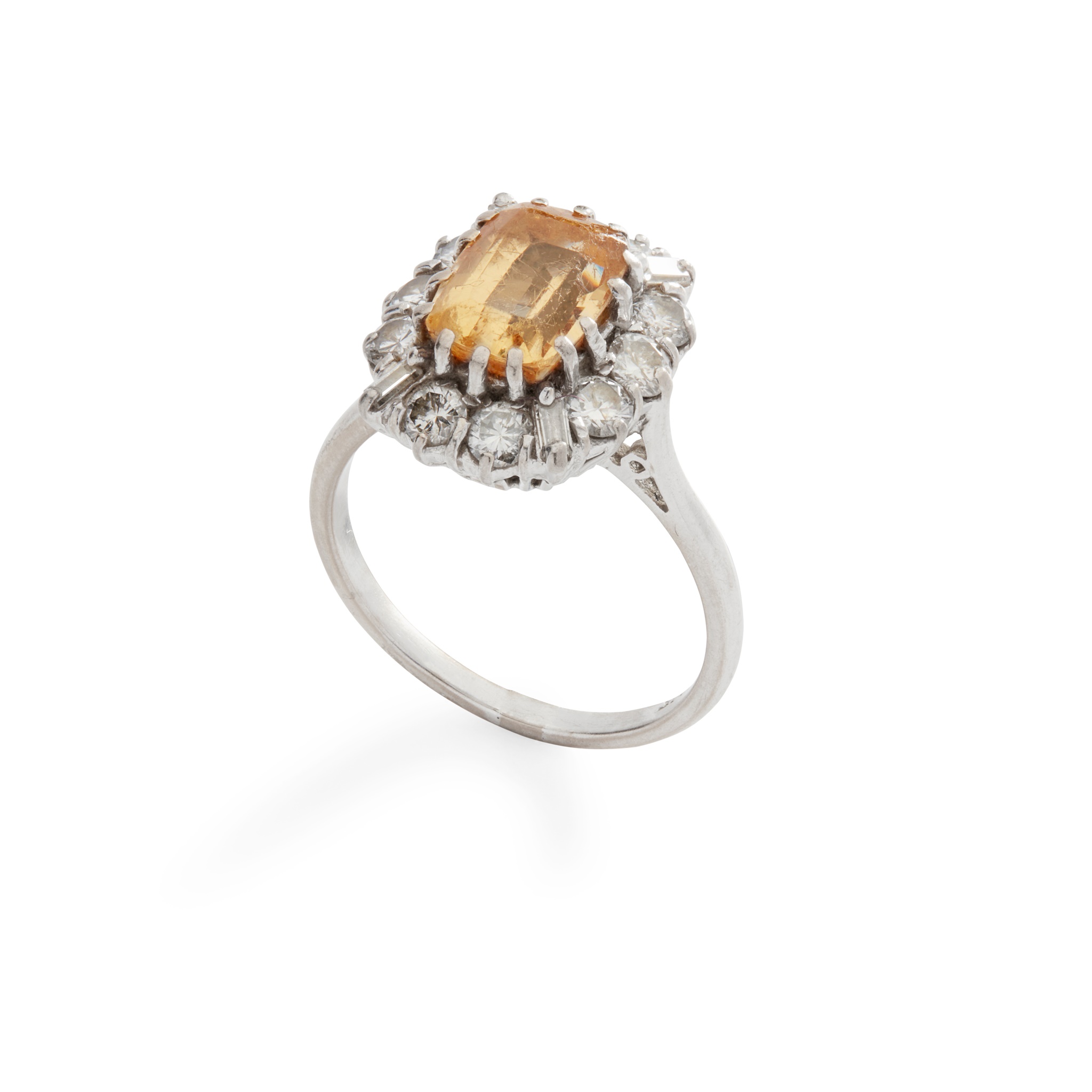A yellow topaz and diamond cluster ring