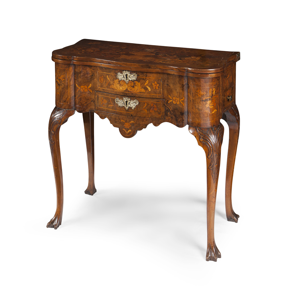 A DUTCH WALNUT AND MARQUETRY FOLDOVER GAMES TABLE