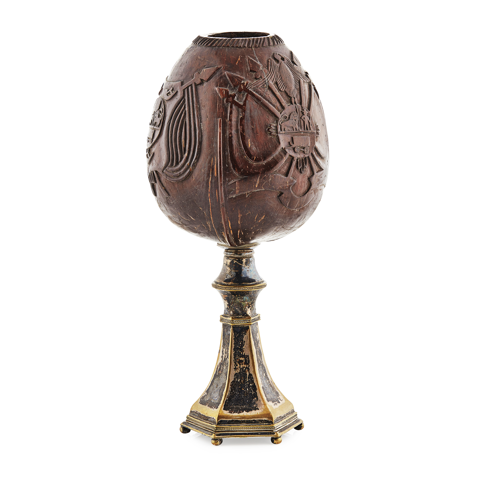A 19th century carved coconut cup on a silver plated stand
