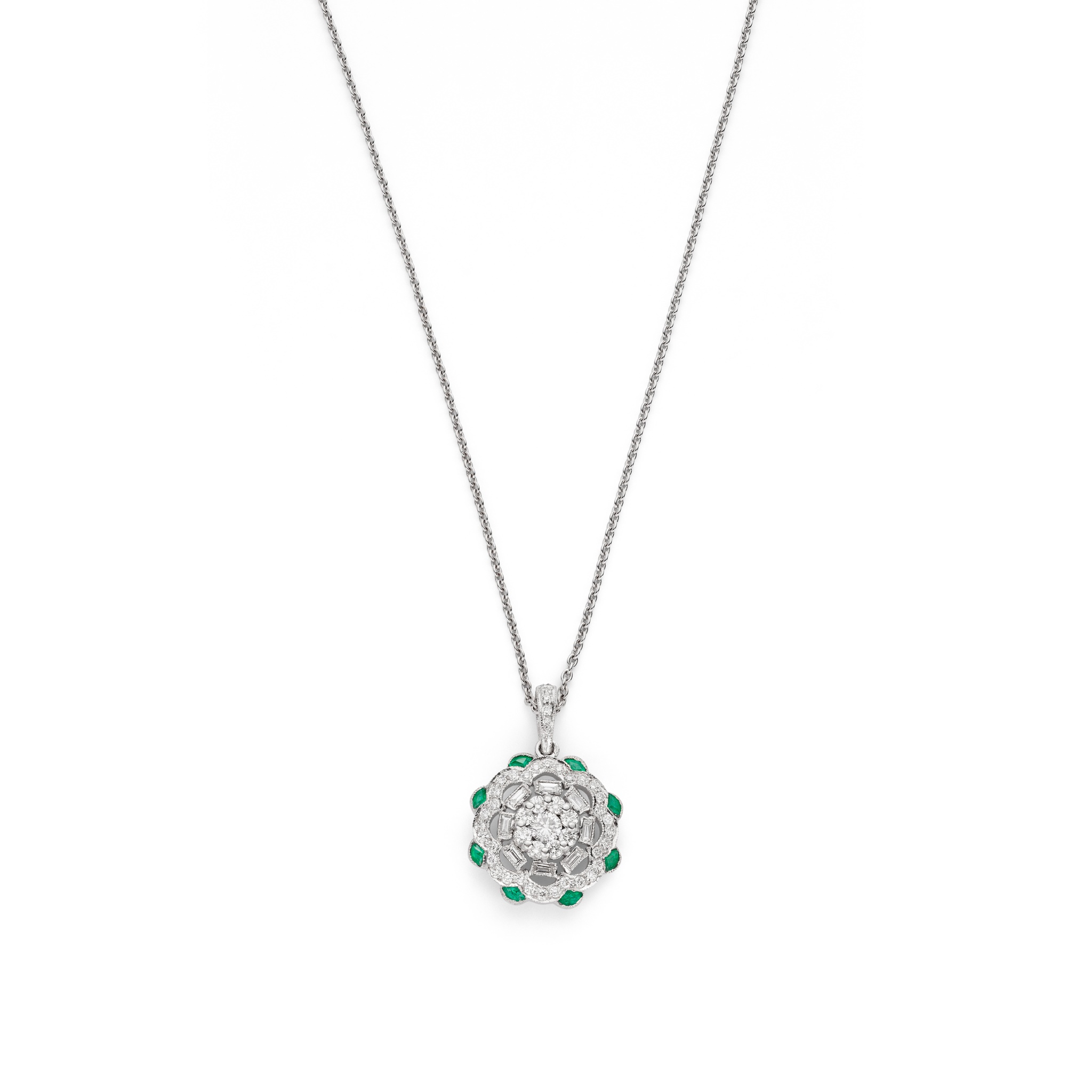 An emerald and diamond pendant