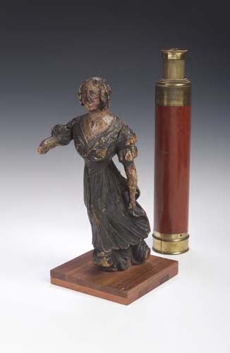 An early 19th century overpainted model,