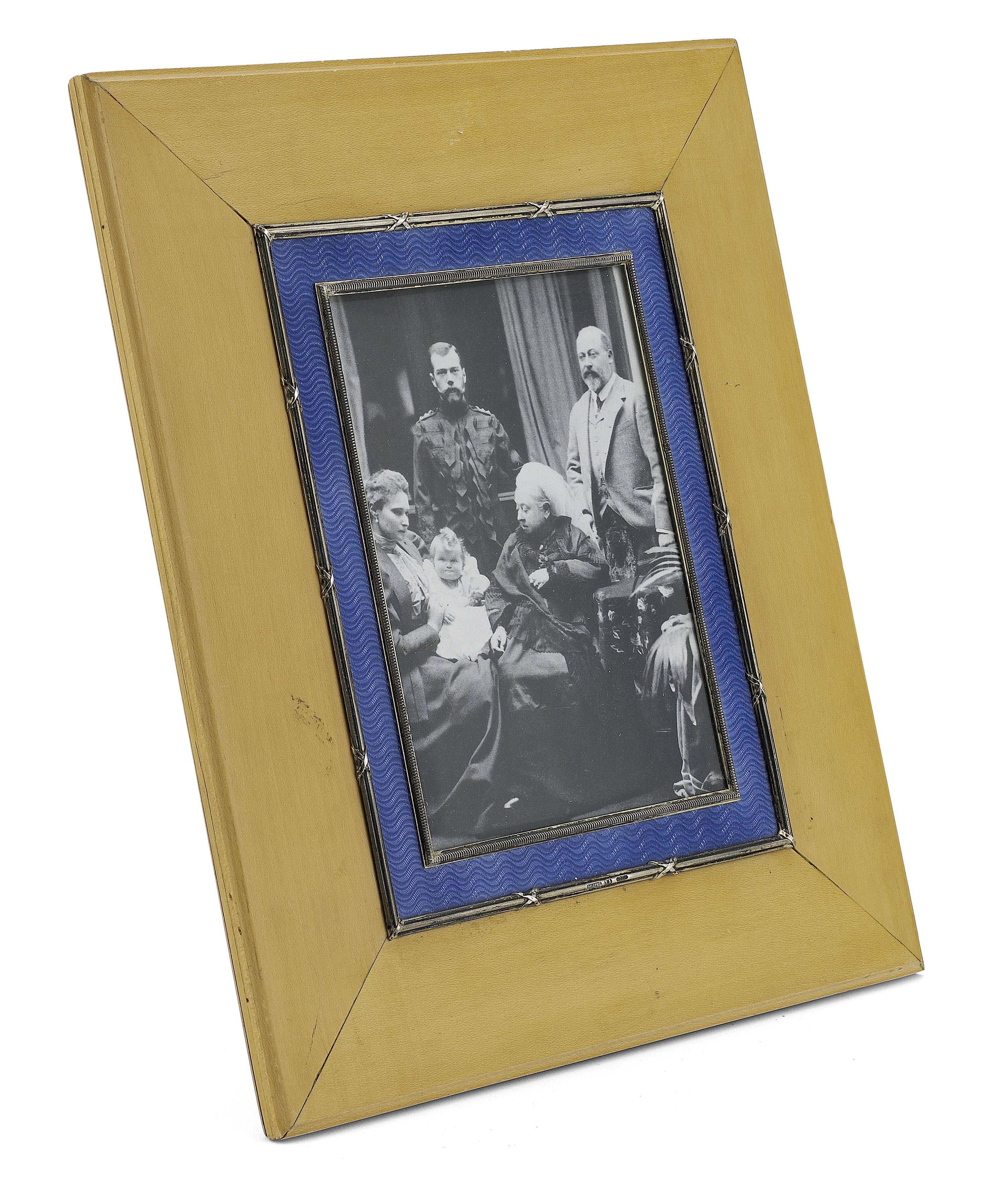 A Fabergé silver-mounted guilloché enamel wood photograph frame