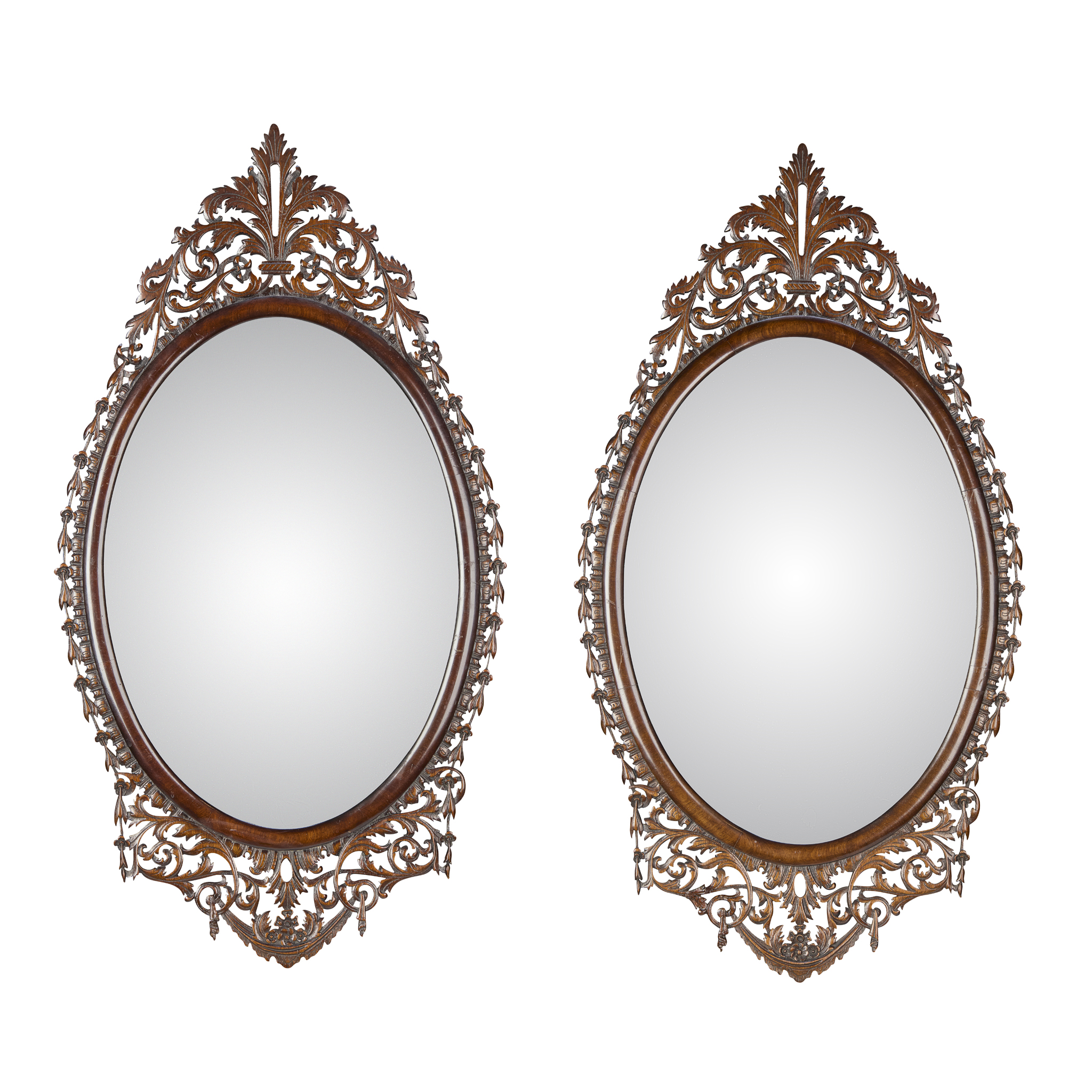 PAIR OF GEORGIAN STYLE CARVED MAHOGANY OVAL MIRRORS