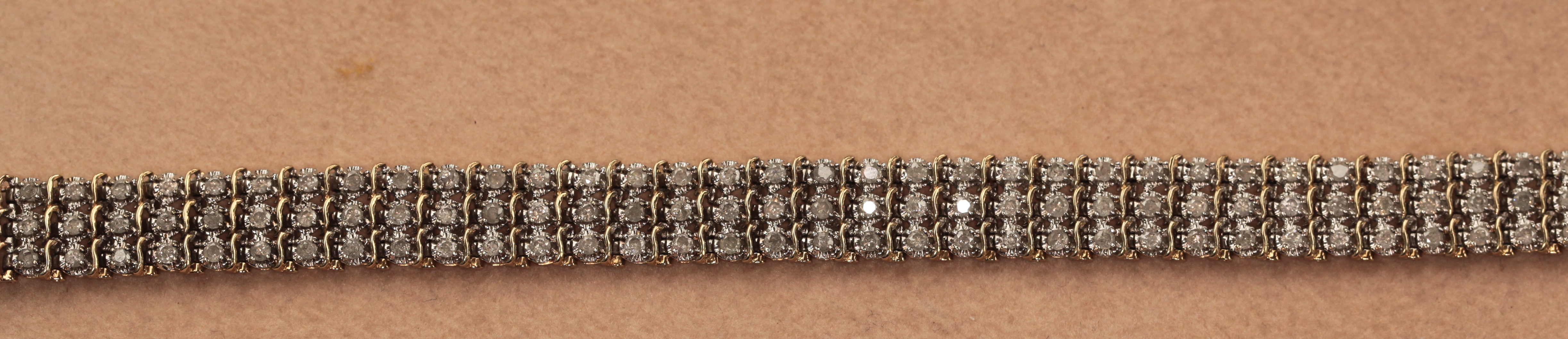 A triple row diamond set bracelet