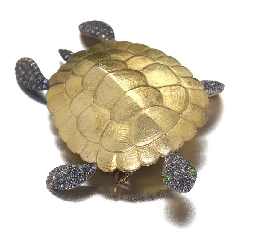 A late 19th century French gold mounted gem set turtle brooch,