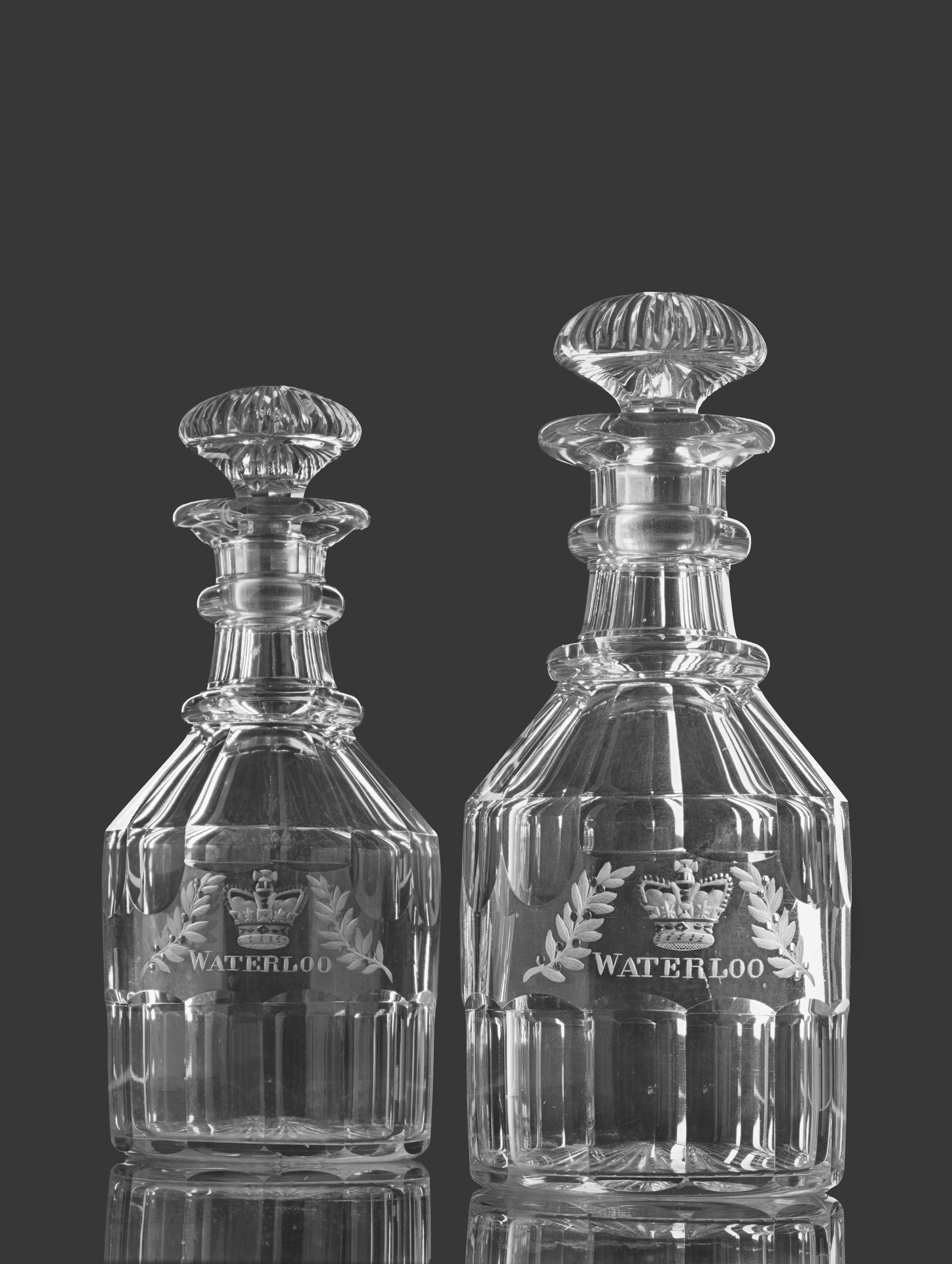 PAIR OF COMMEMORATIVE CUT GLASS 'WATERLOO' GLASS DECANTERS & STOPPERS