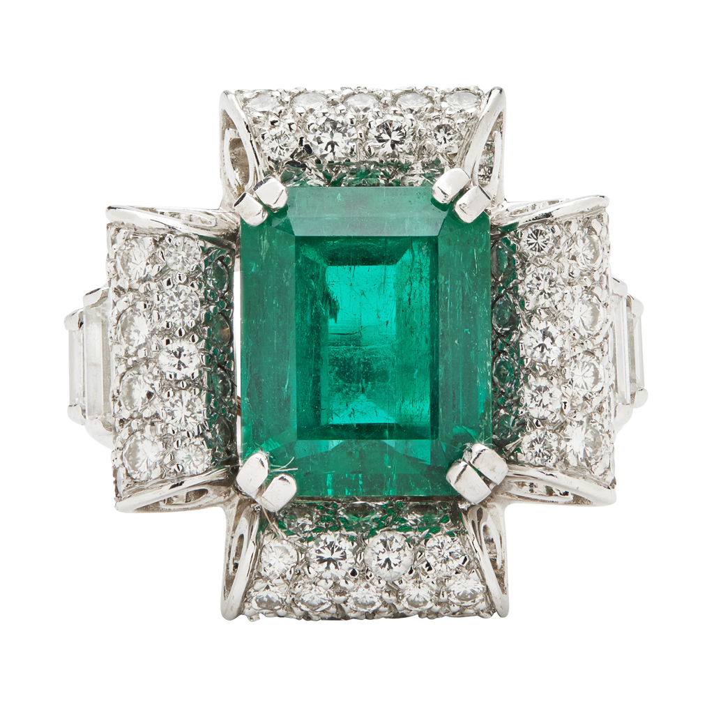 An emerald and diamond set cocktail ring
