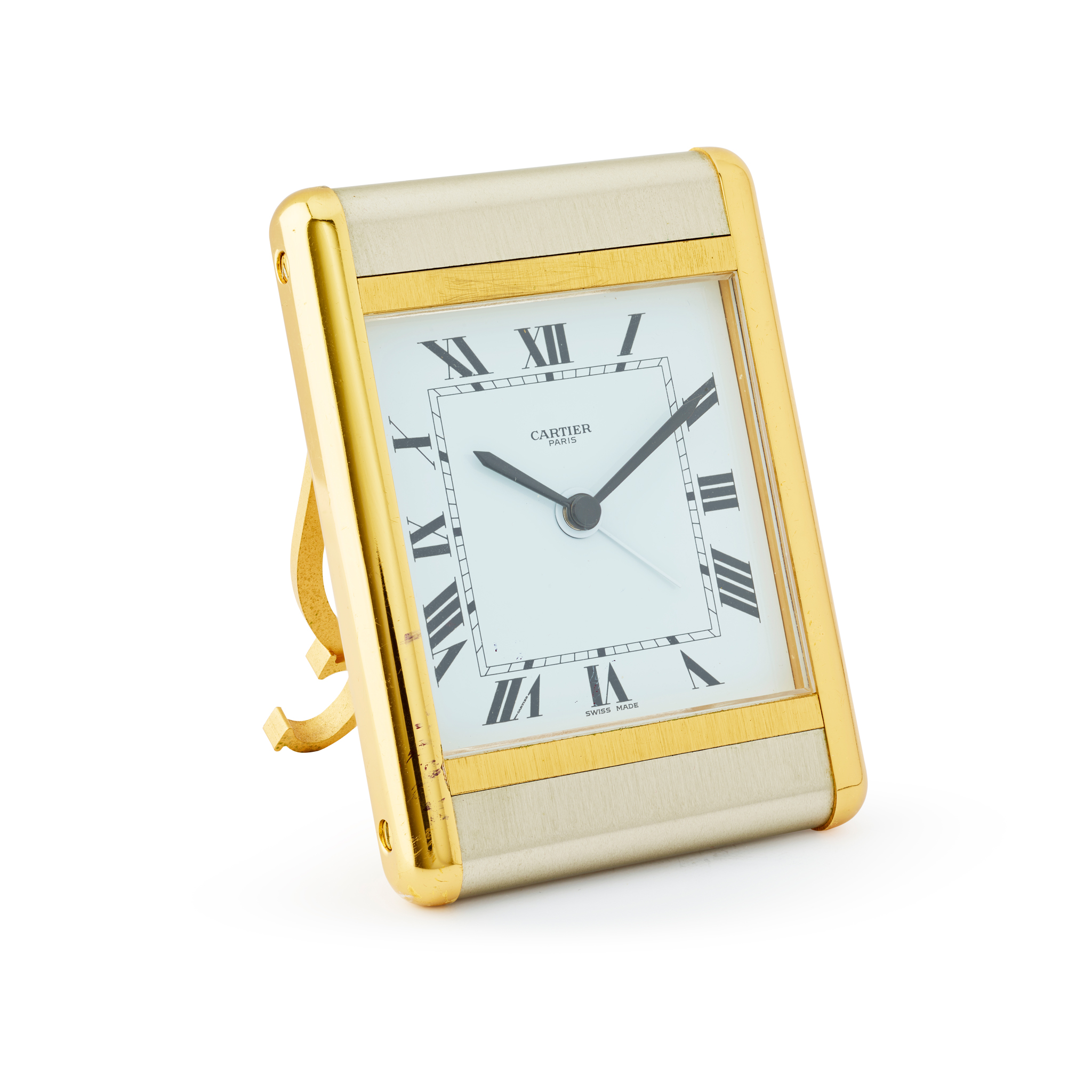 Cartier. A two-tone stainless steel and gilt quartz alarm clock