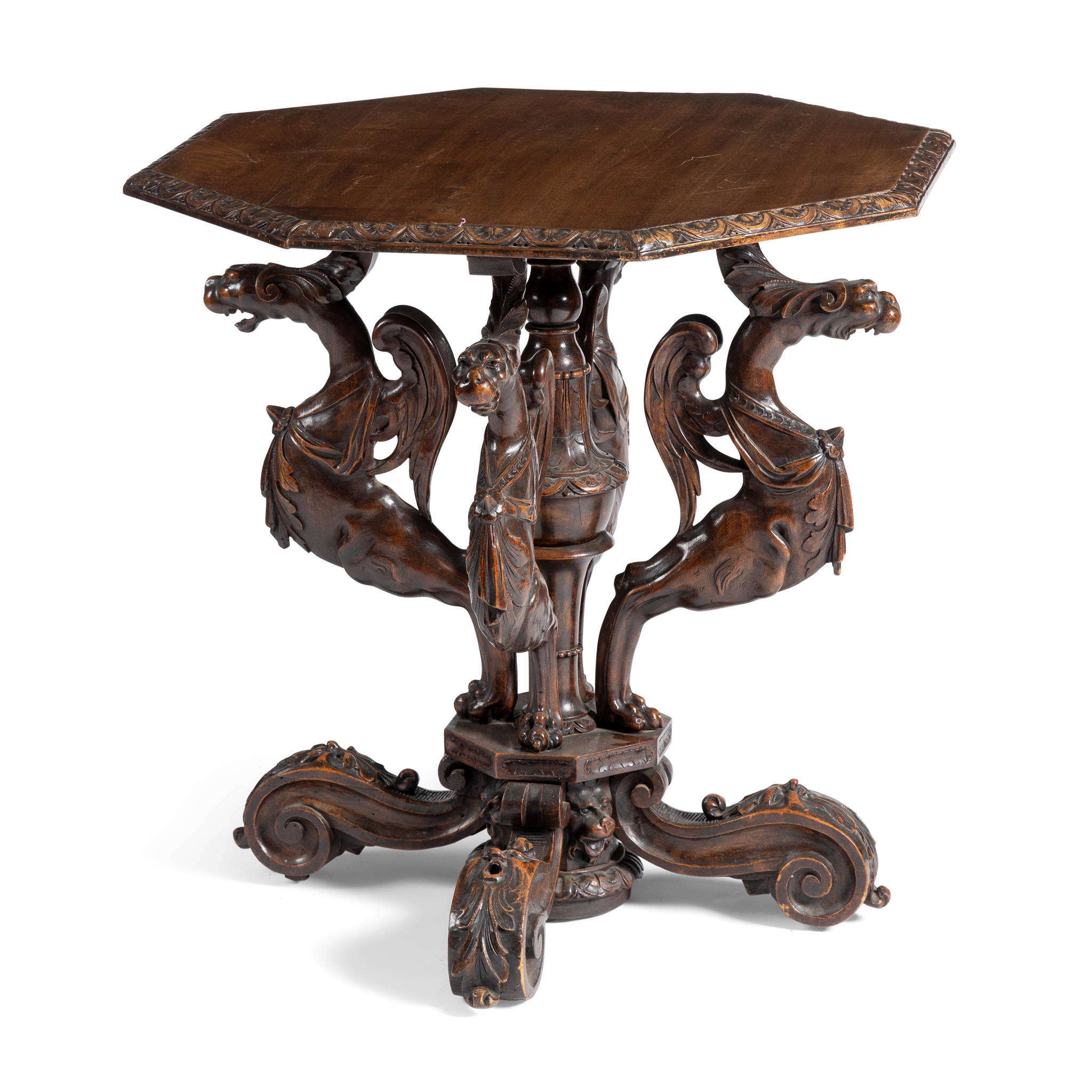 A VICTORIAN MAHOGANY AND WALNUT CENTRE TABLE