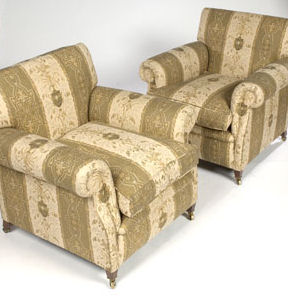 A pair of upholstered armchairs