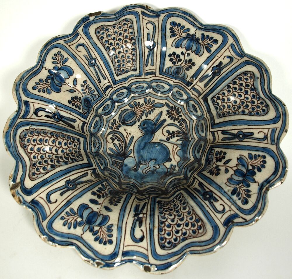 A 17th century Dutch Delft lobed bowl In the Kraak style