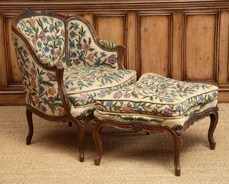 A French walnut and upholstered duchesse