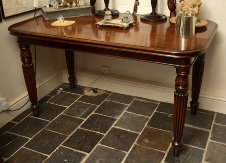 A mahogany writing table