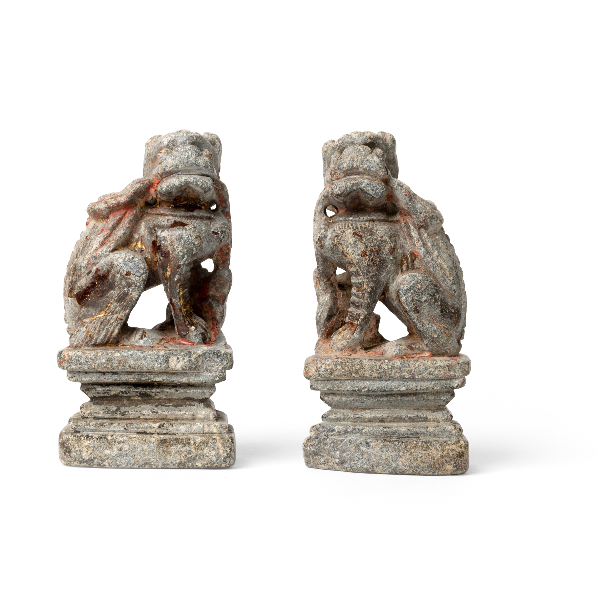 PAIR OF CHINESE GILT AND LACQUERED STONE CRAVINGS OF BUDDHIST-LIONS