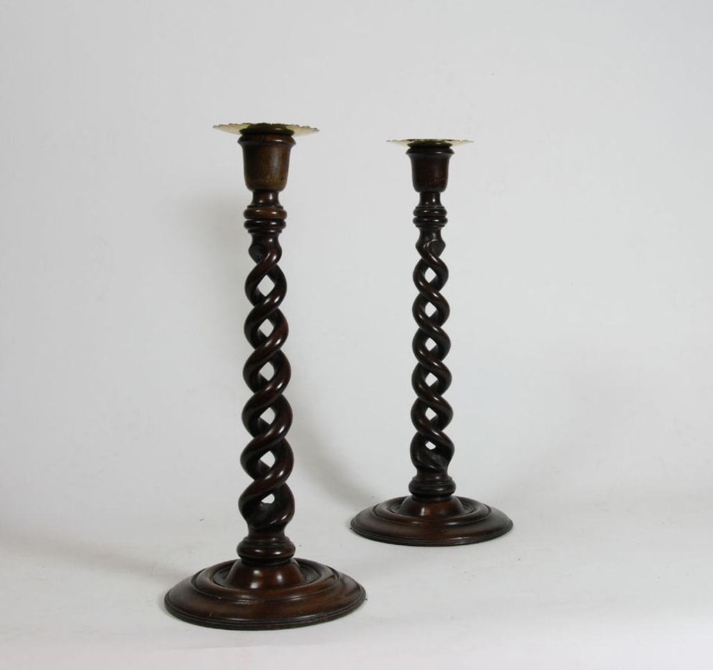 A pair of Regency mahogany twin spiral column candlesticks