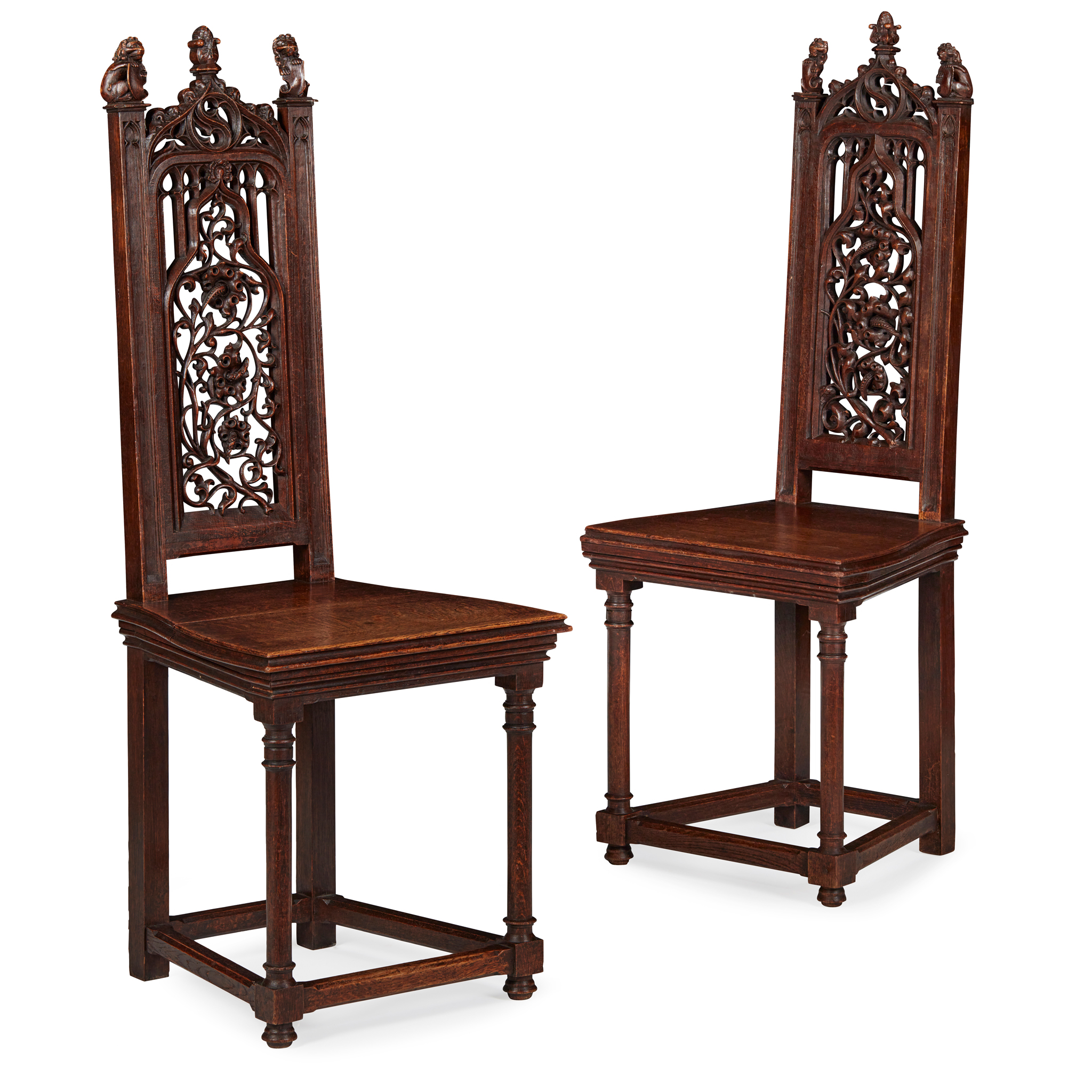 PAIR OF GOTHIC STYLE CARVED OAK CHAIRS