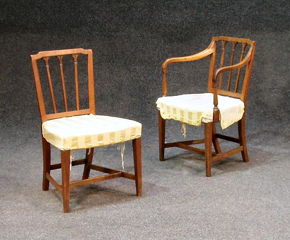 A set of eight mahogany country Sheraton dining chairs