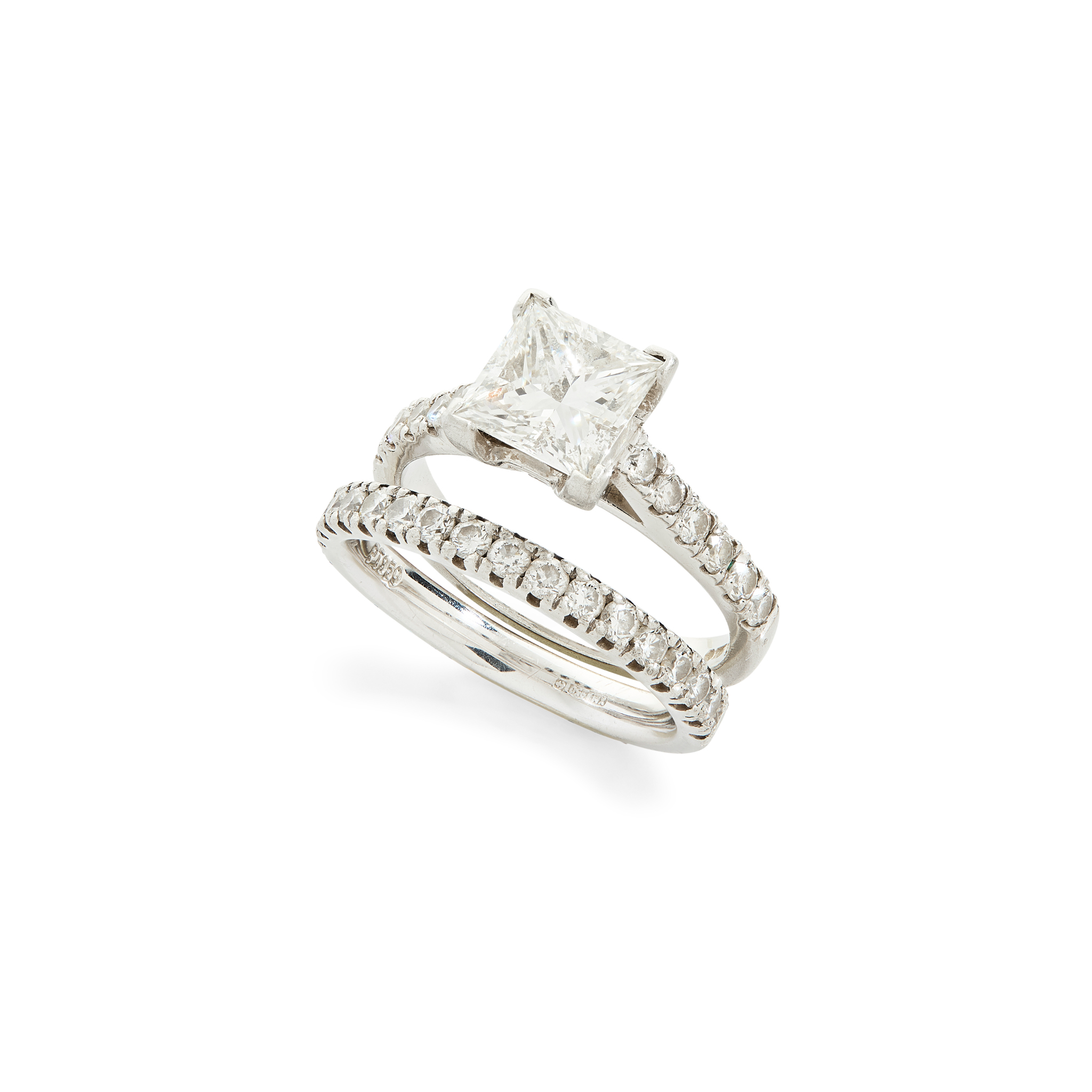 A platinum diamond single-stone ring and band