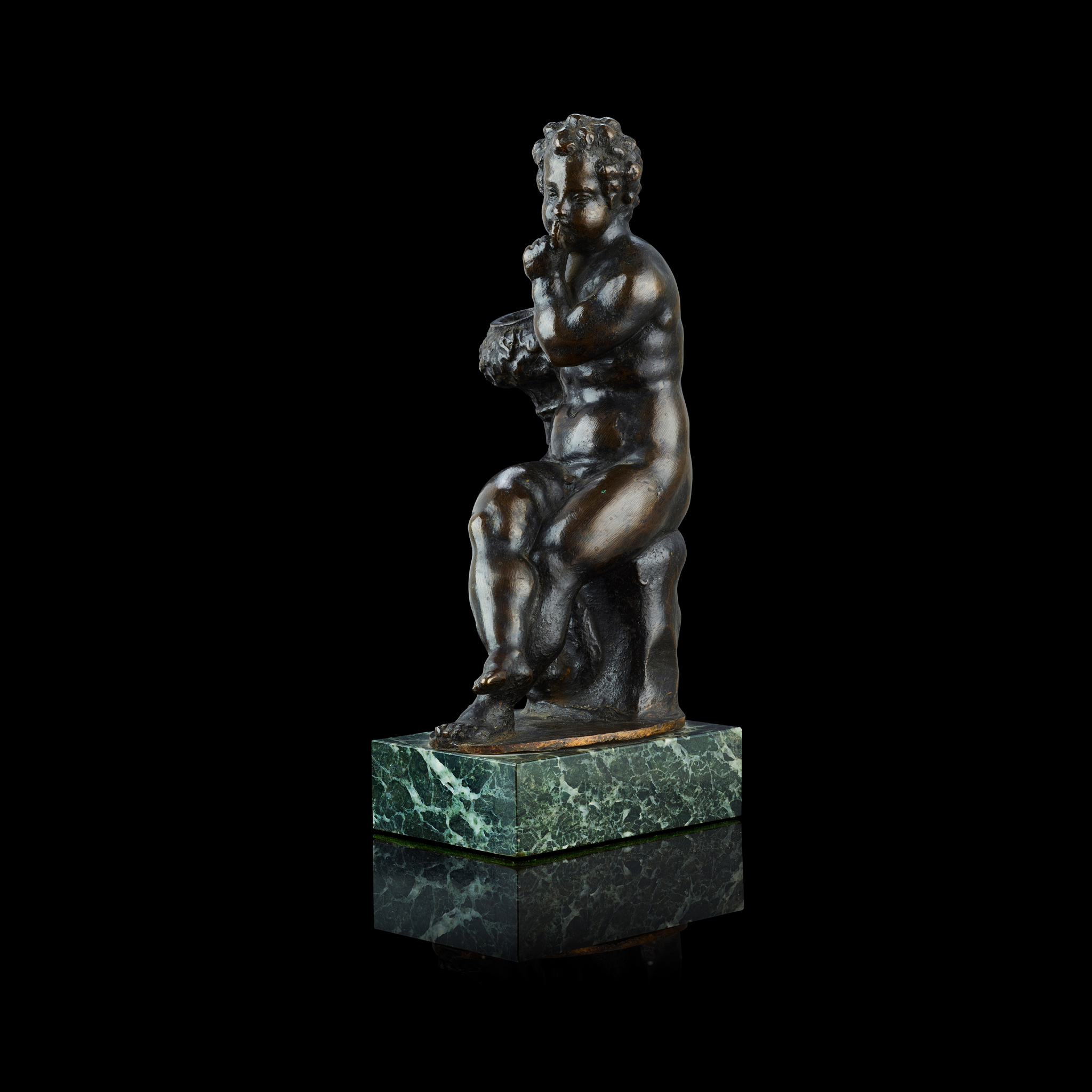 AN ITALIAN BRONZE FIGURE OF A PUTTO WITH A CORNUCOPIA, ATTRIBUTED TO NICCOLÒ ROCCATAGLIATA