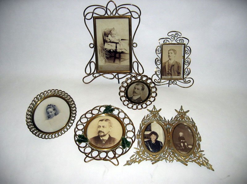 Six Edwardian brass photo frames