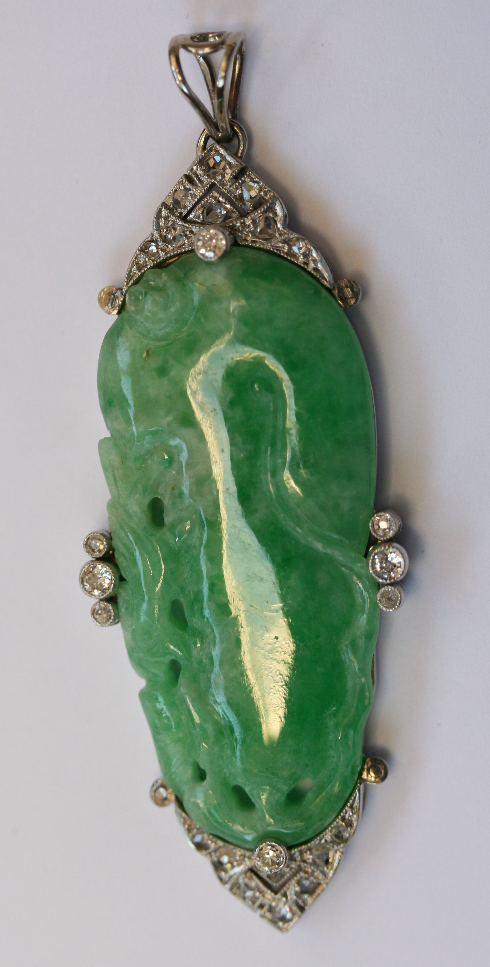 CATALOGUE ALTERATION A jade and diamond pendant