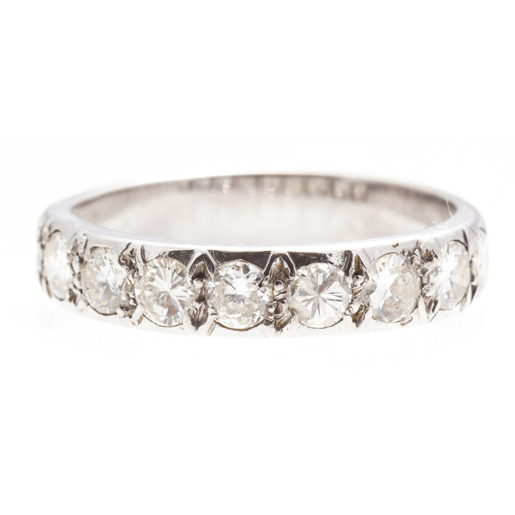 A diamond set half eternity ring