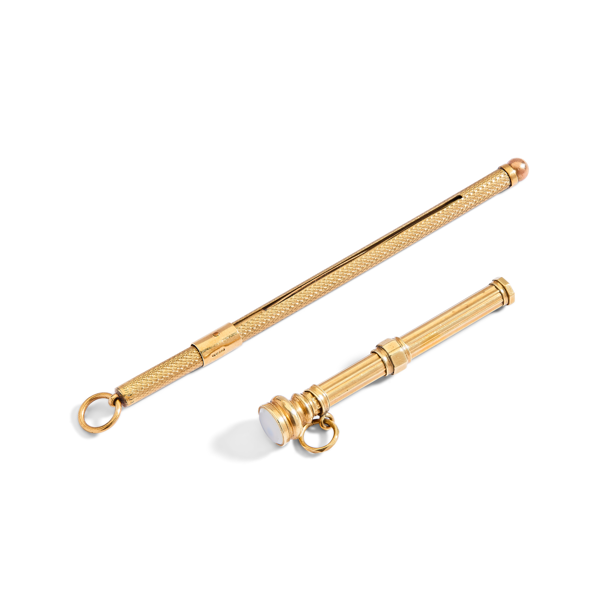 A 9ct gold swizzel stick and a propelling pencil