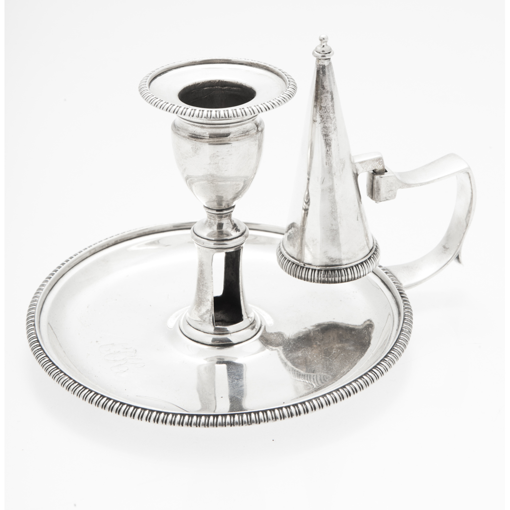 A George III chamber stick and snuffer