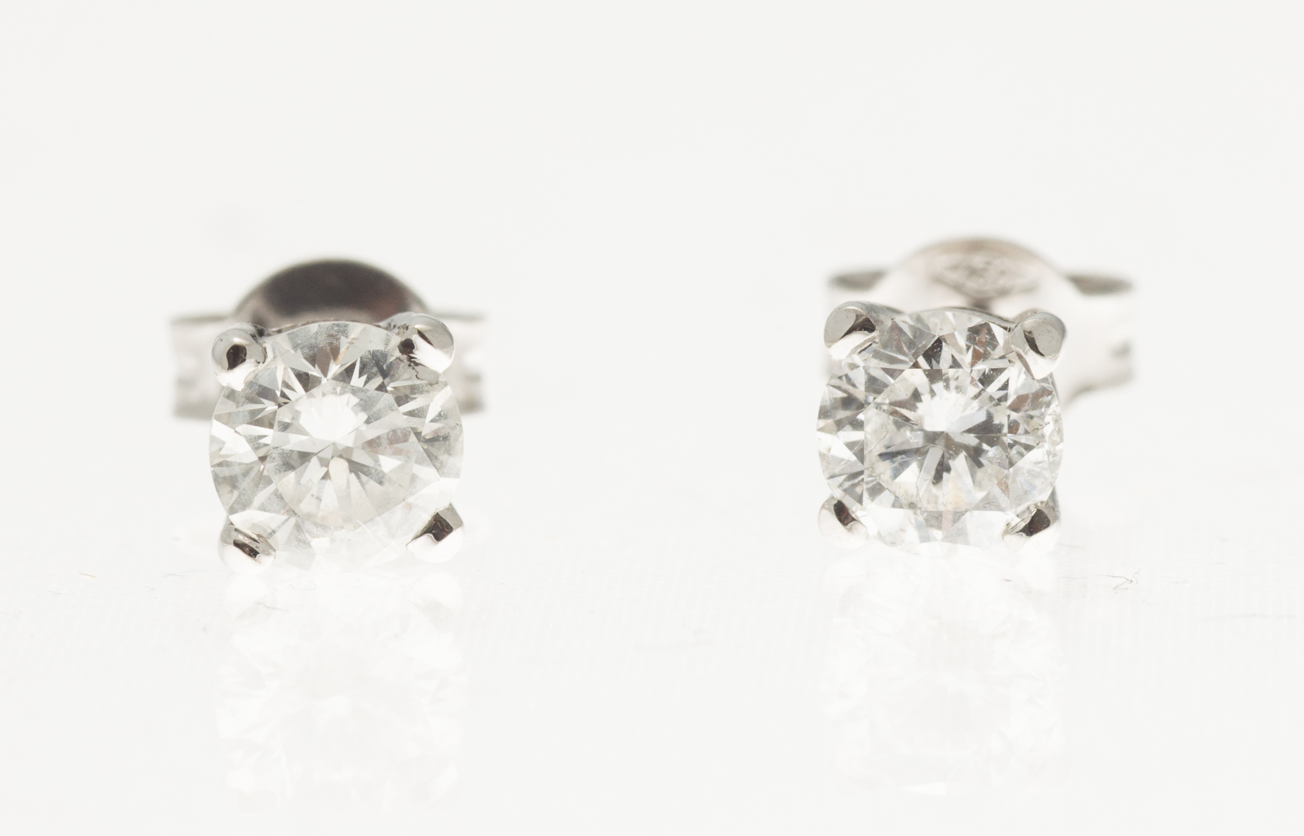 A pair of diamond set ear-studs