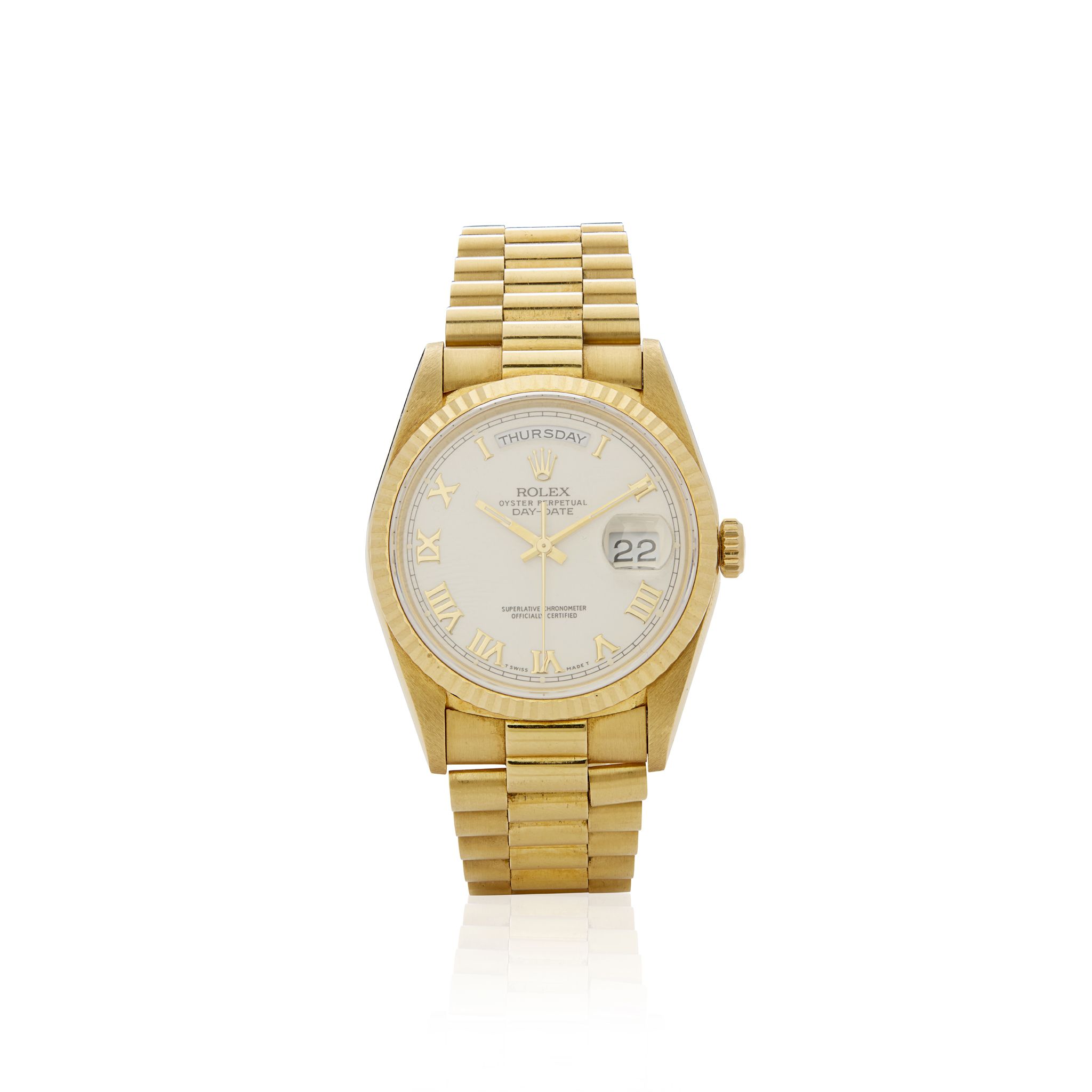 Rolex. A very well preserved 18k yellow gold automatic wristwatch with day and date