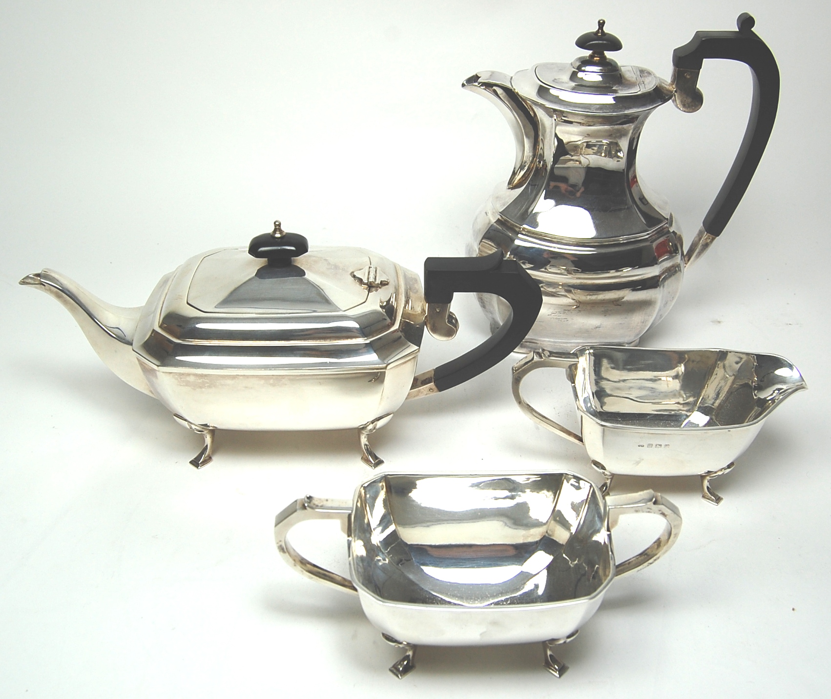A matched modern four piece tea and coffee service