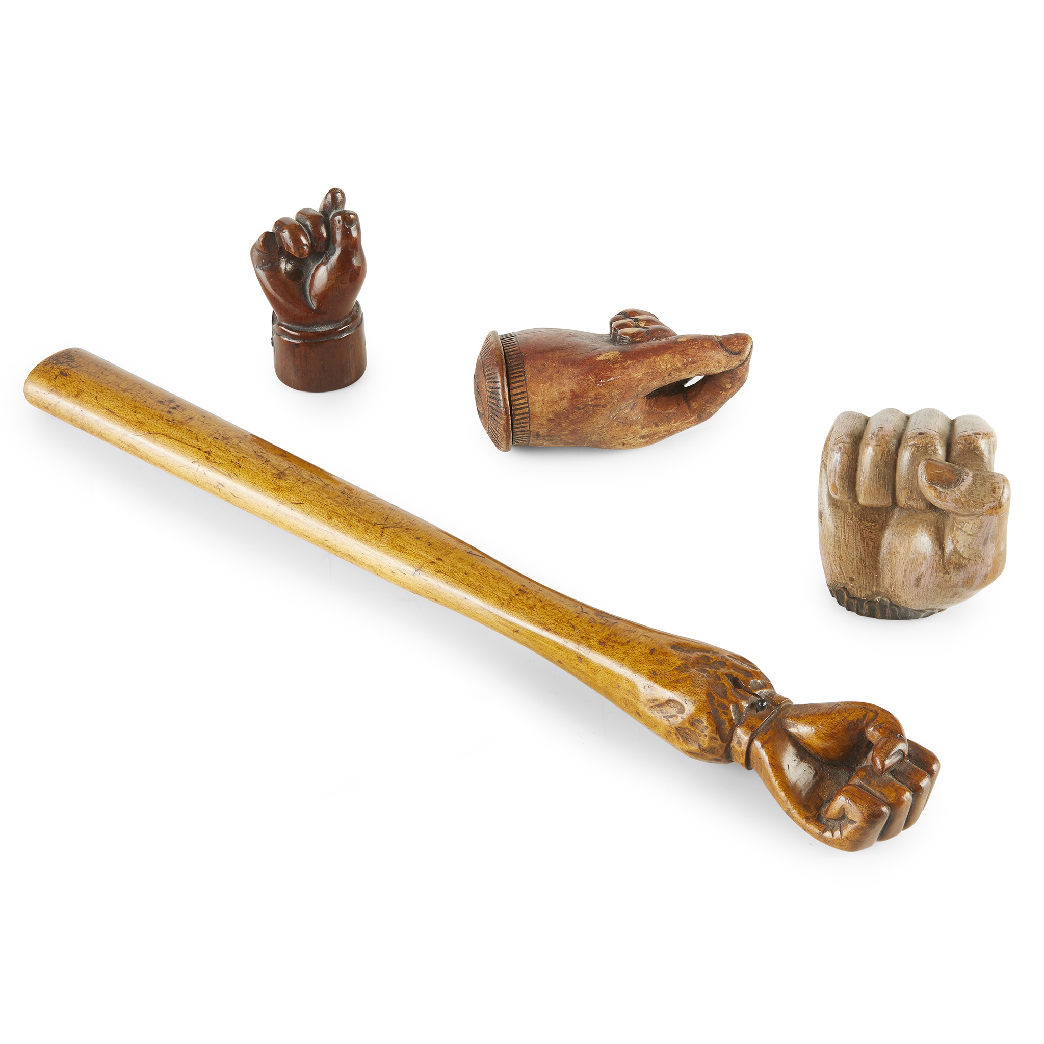 THREE CARVED HAND SNUFF BOXES