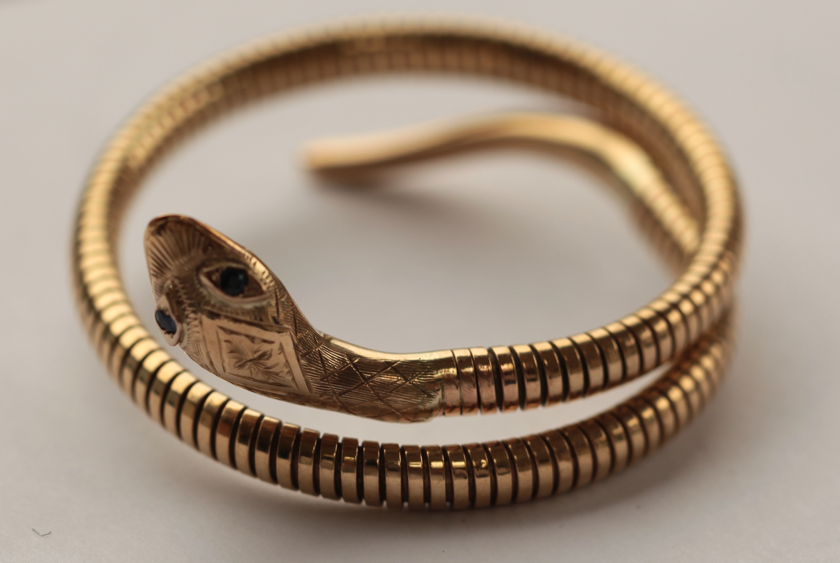 A modern 9ct yellow gold bangle