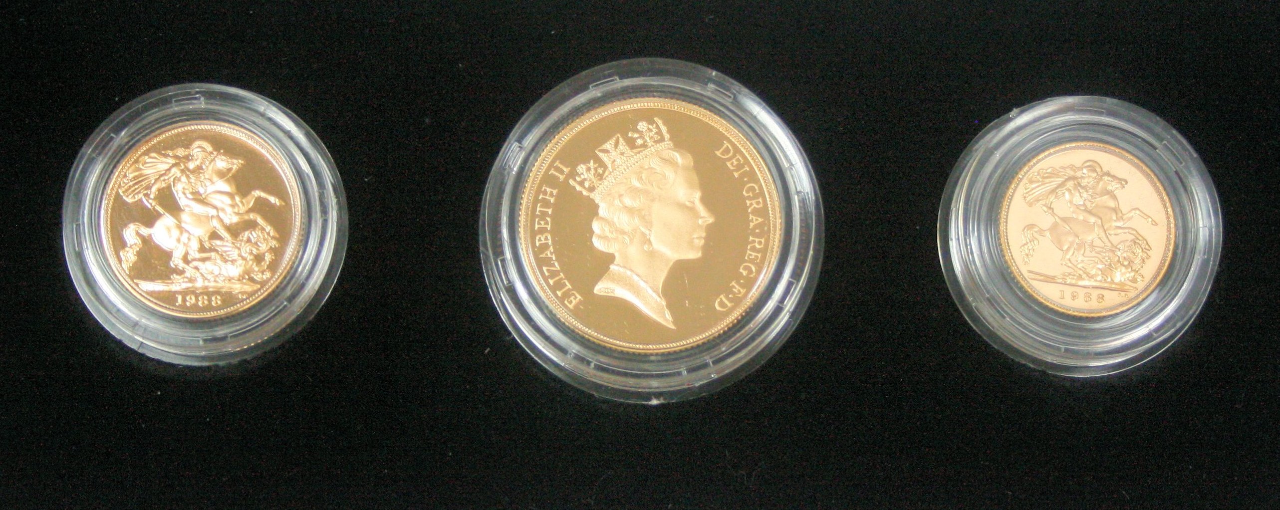 An Elizabeth II gold three coin proof set