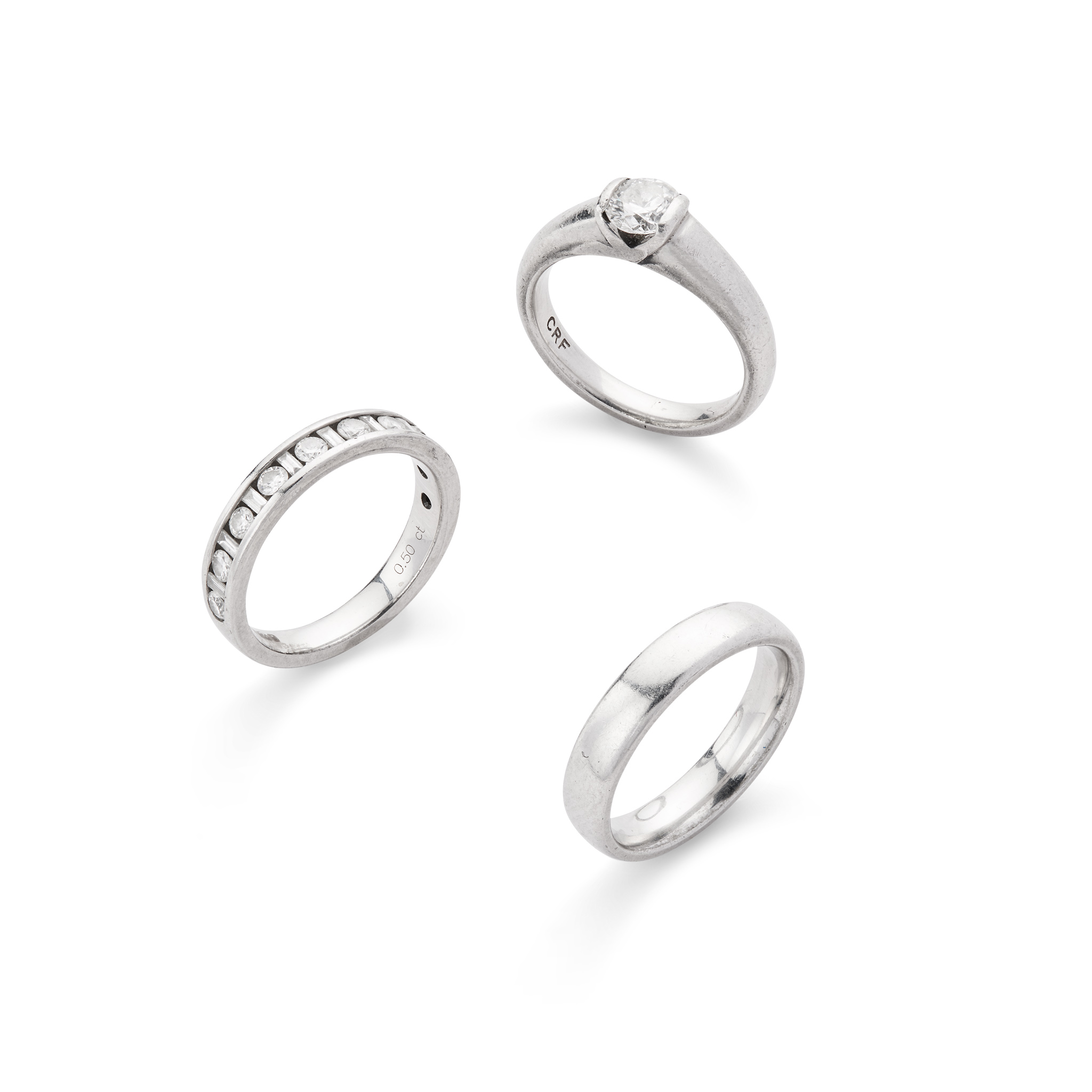 A set of three diamond and platinum rings