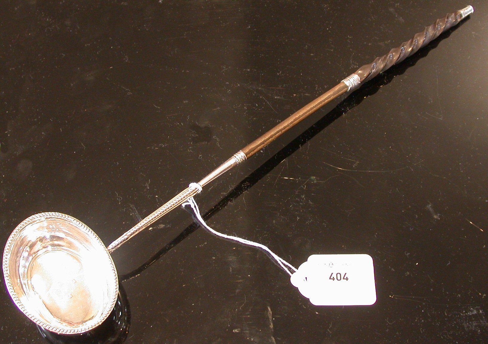 A George III toddy ladle,