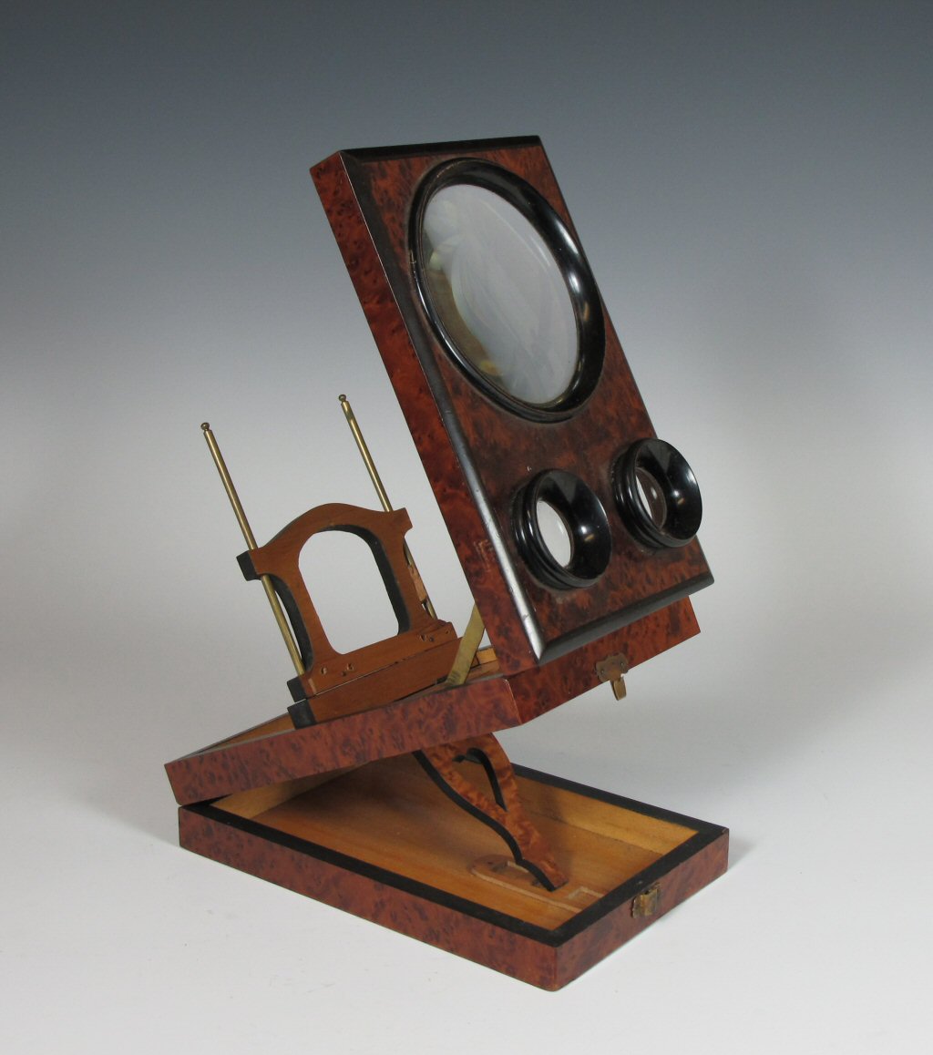 A 19th century burr walnut stereoscope viewer