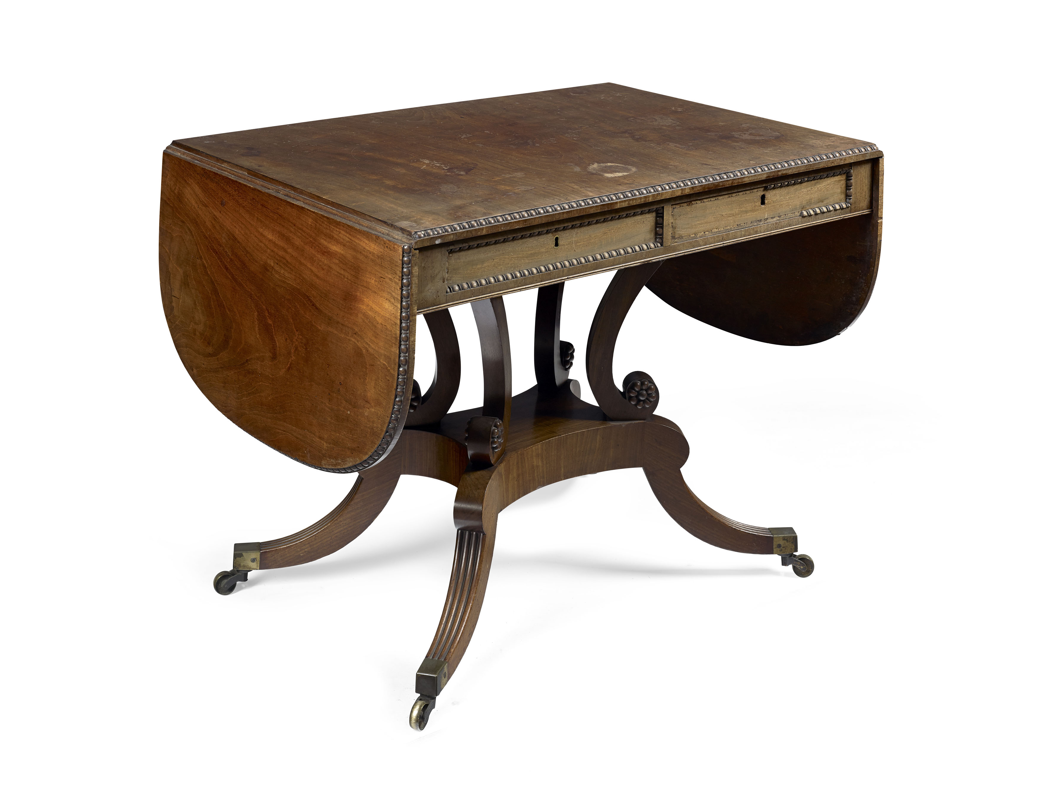 REGENCY MAHOGANY SOFA TABLE IN THE MANNER OF WILLIAM TROTTER