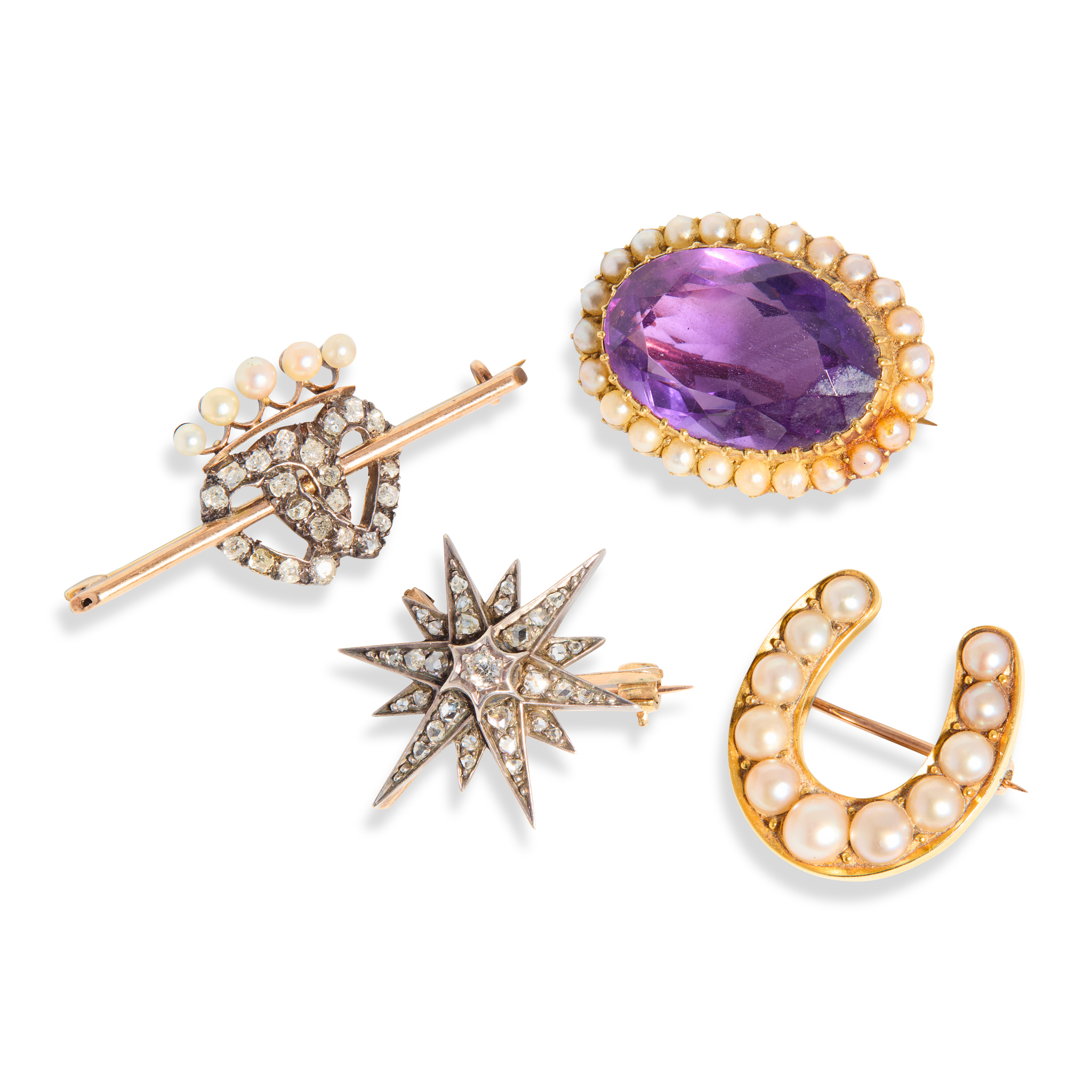 A collection of gem-set brooches