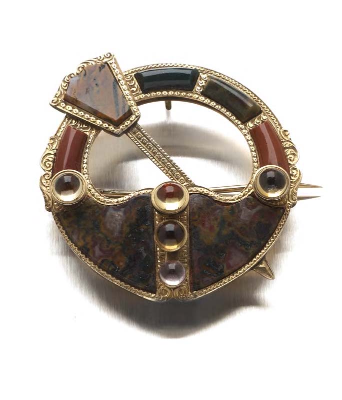 A Victorian gold mounted Scottish pebble brooch,