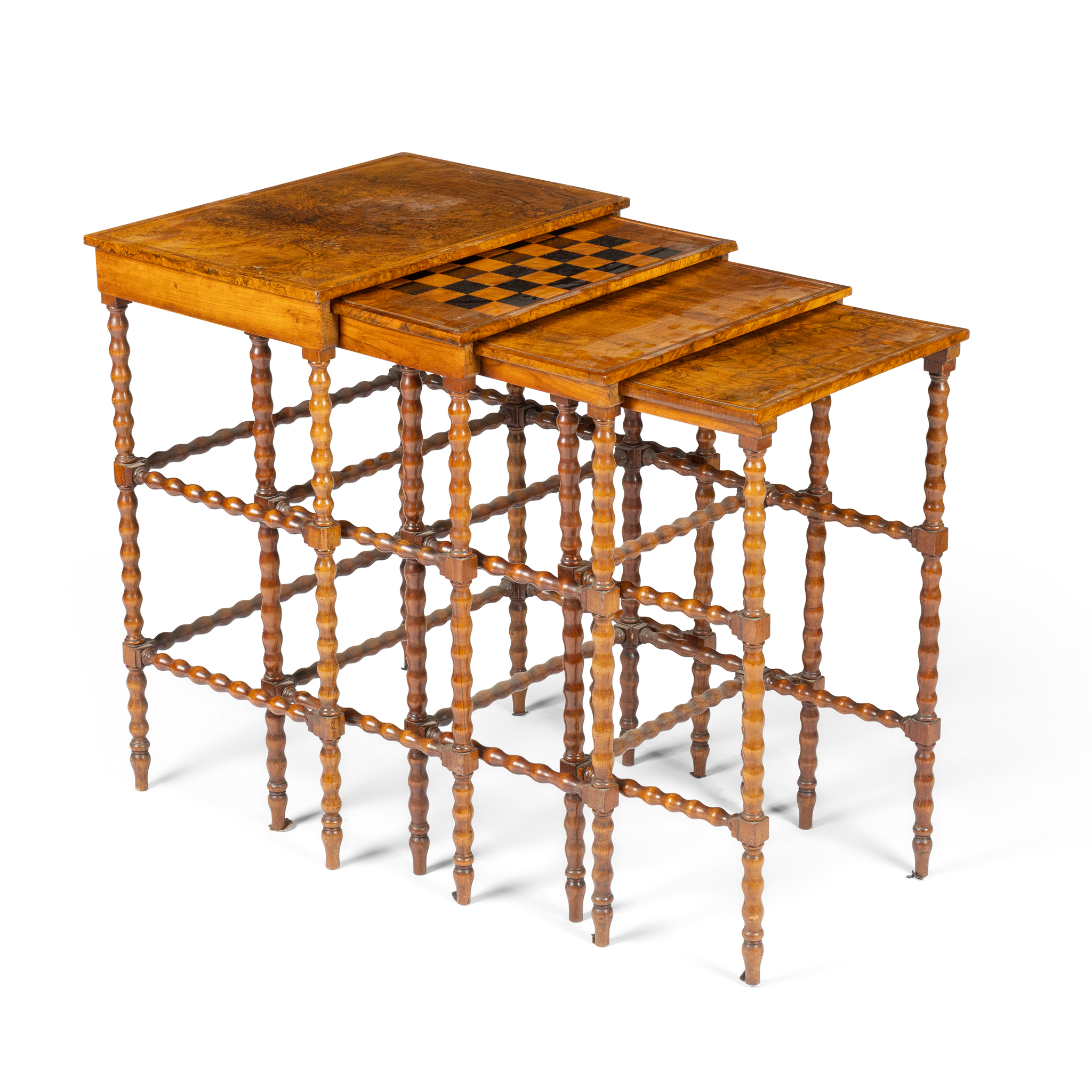 A VICTORIAN NEST OF FOUR BURR WALNUT TABLES