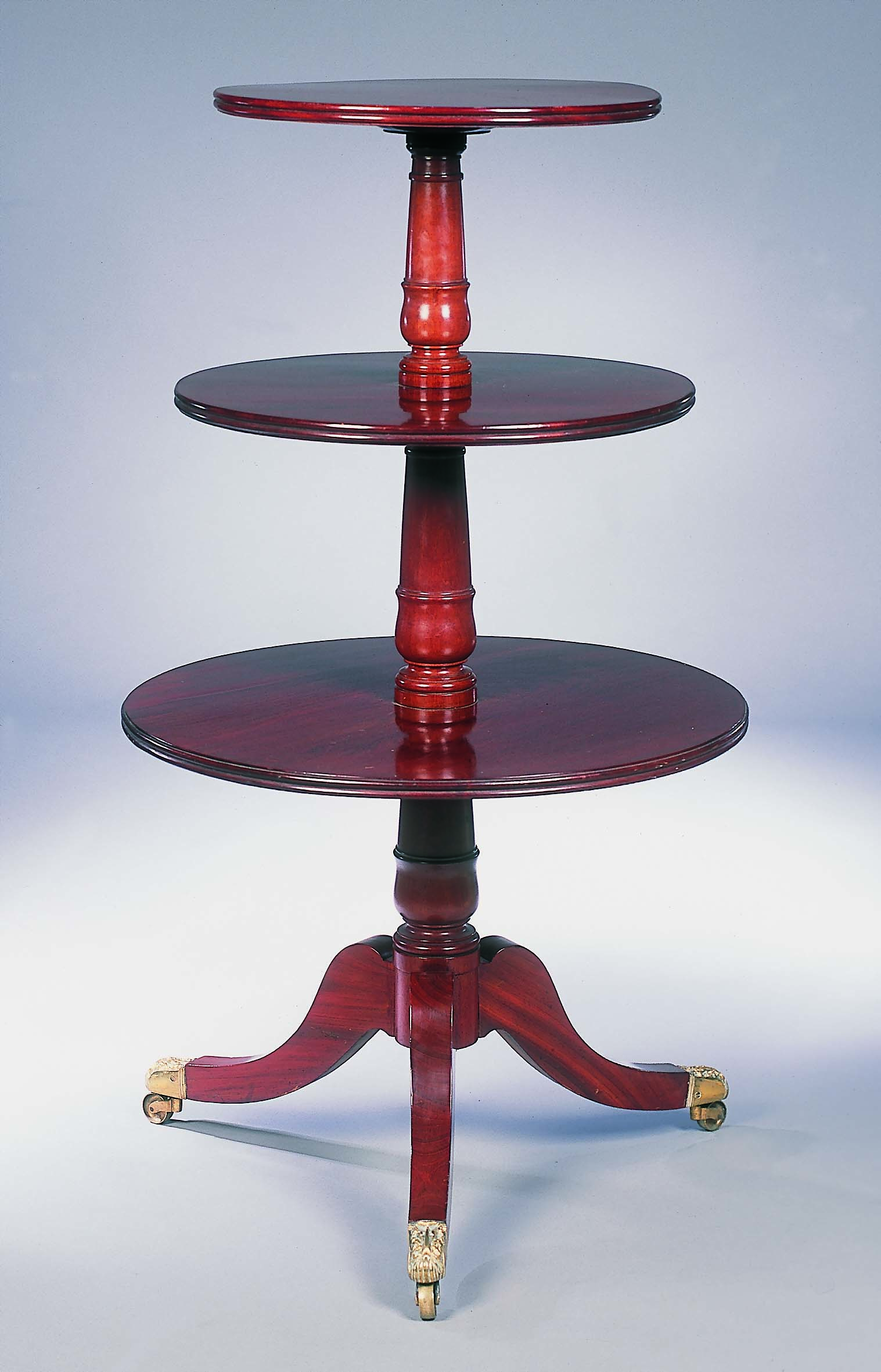 An Edwardian mahogany three tier dumb waiter