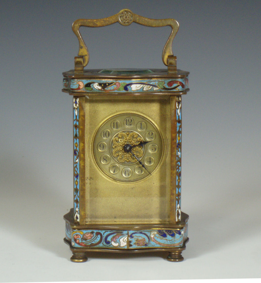 A late 19th/early 20th century French enamel and gilt metal carriage clock