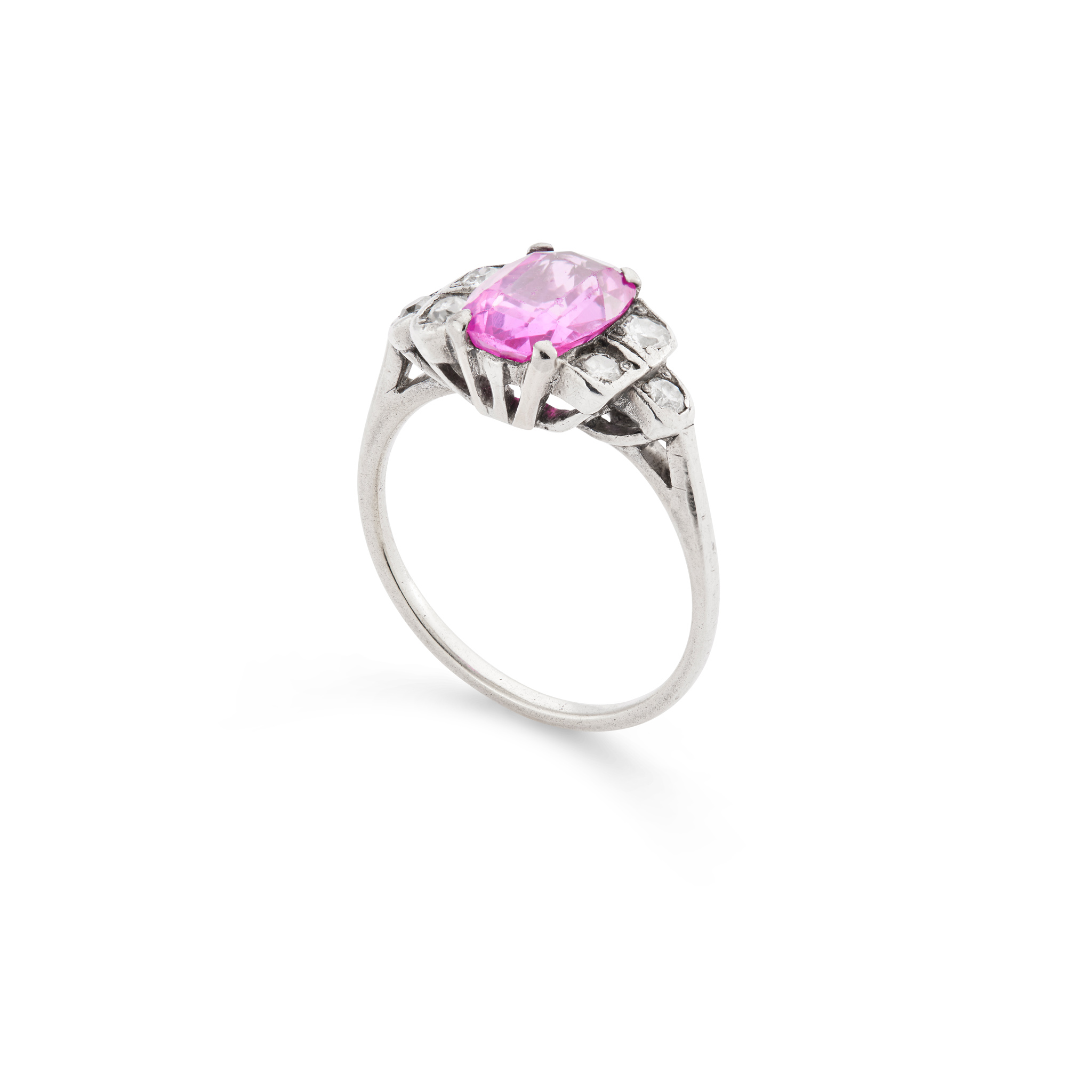 A pink sapphire and diamond ring