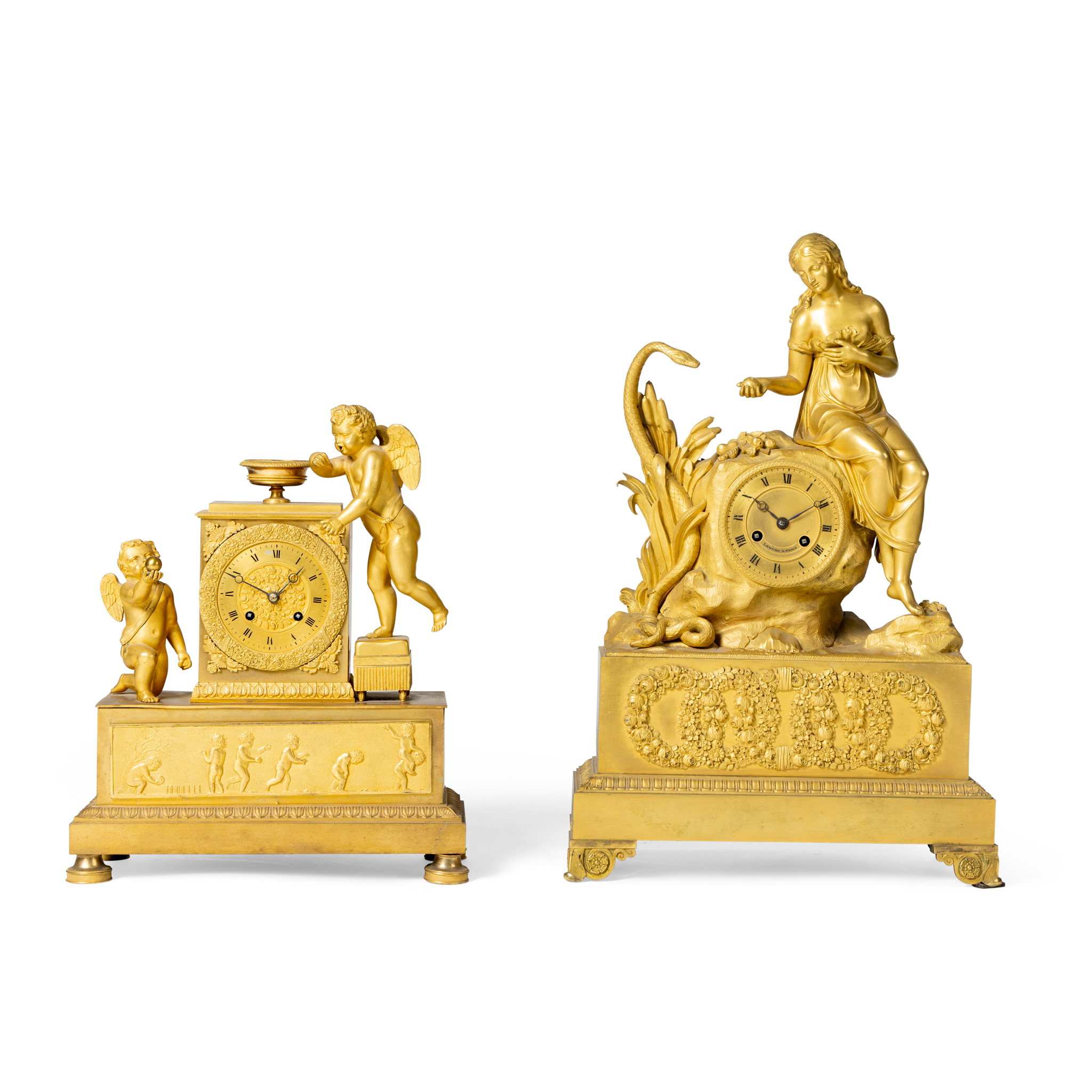 A FRENCH GILT METAL MANTEL CLOCK