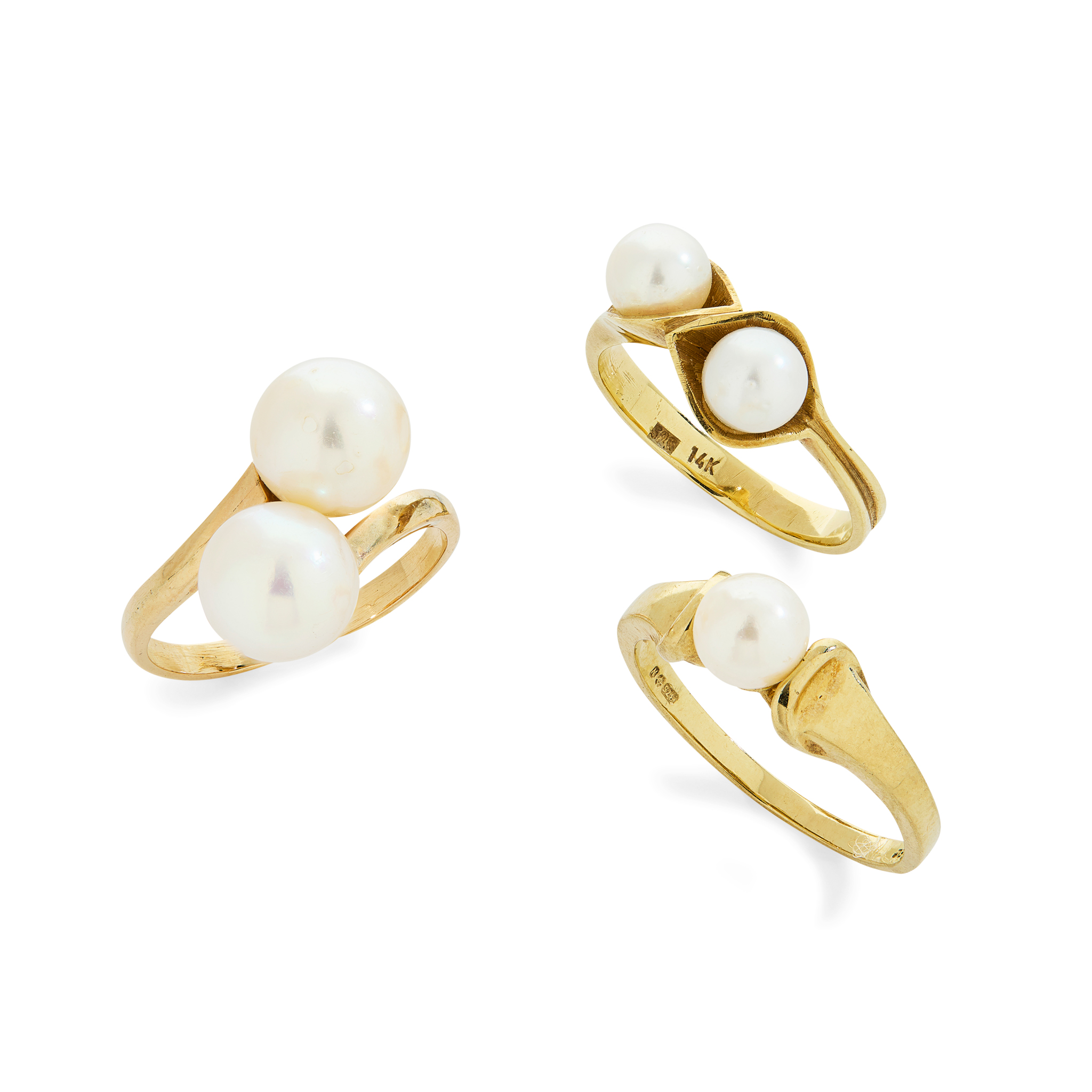 Three cultured pearl dress rings