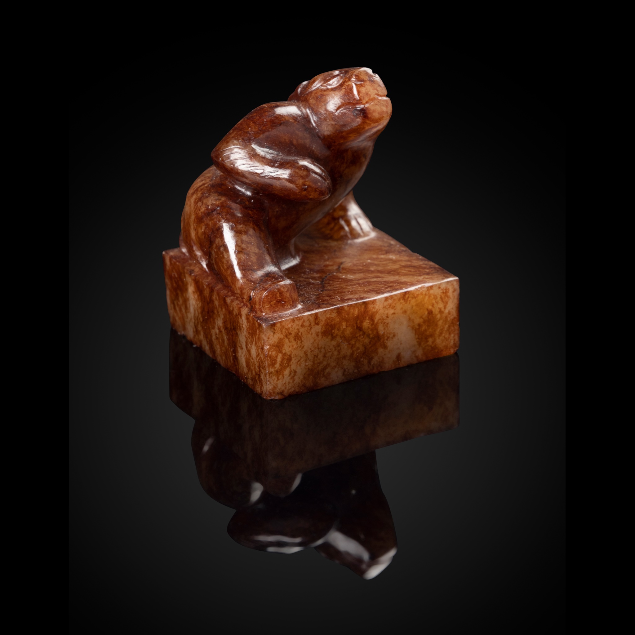 WHITE JADE WITH RUSSET INCLUSION CARVING OF 'BEAR' SEAL