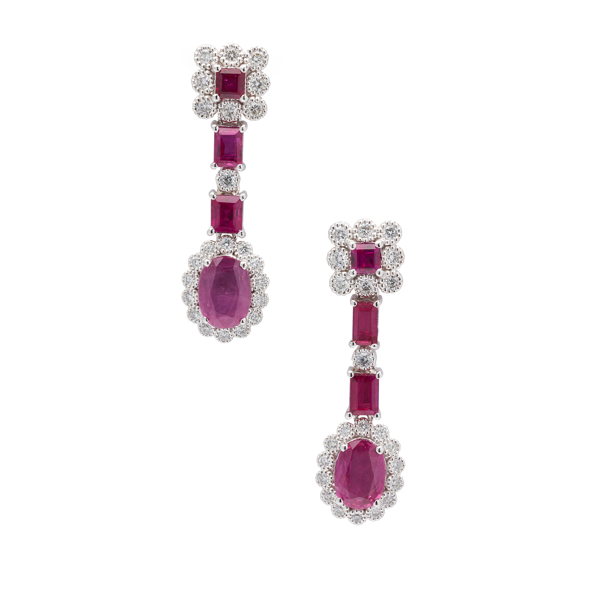 A pair of ruby and diamond pendent earrings